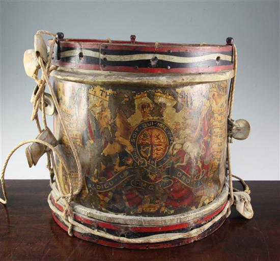 An early 20th century military brass drum for the Gloucestershire Regiment, 14.5in.